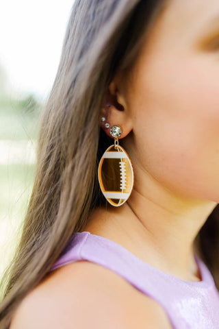 Taylor Shaye: Mirror Acrylic Football Earrings